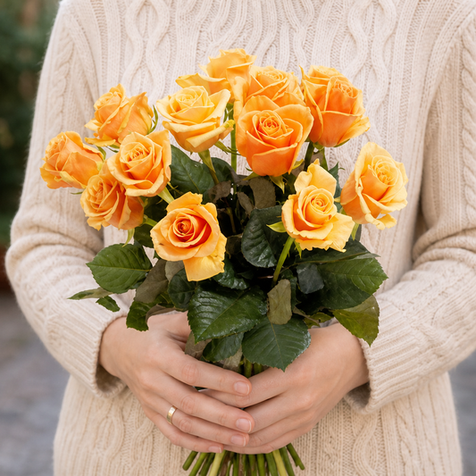 Person holding the SPARKLING bouquet outdoors, torso only without face